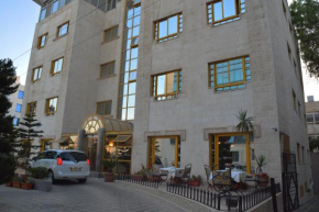Capri Hotel Suites